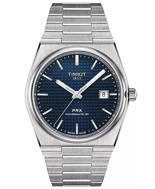A stainless steel Tissot PRX Powermatic 80 wristwatch with a blue textured dial, silver hour markers, date display at 3 o’clock, and integrated steel bracelet.